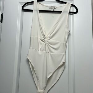 Women’s creme bodysuit
